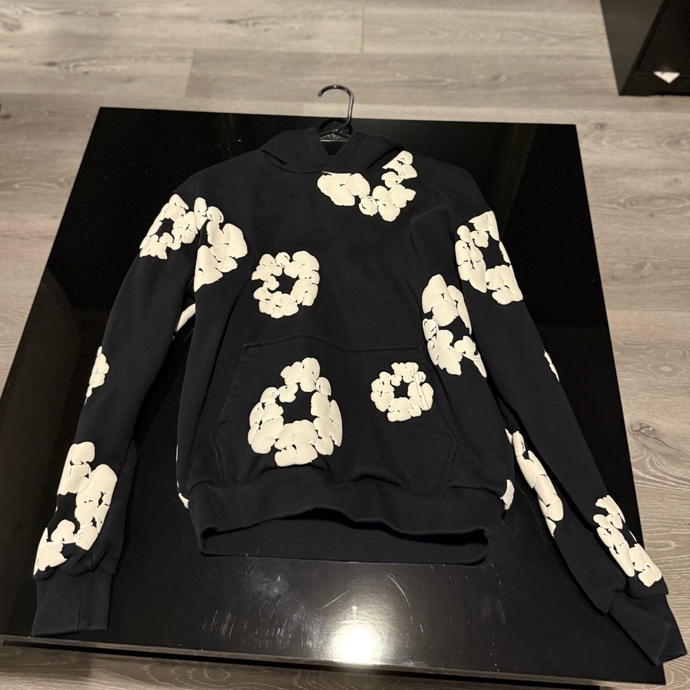 Denim Tears Black Hoodie with White Floral Pattern